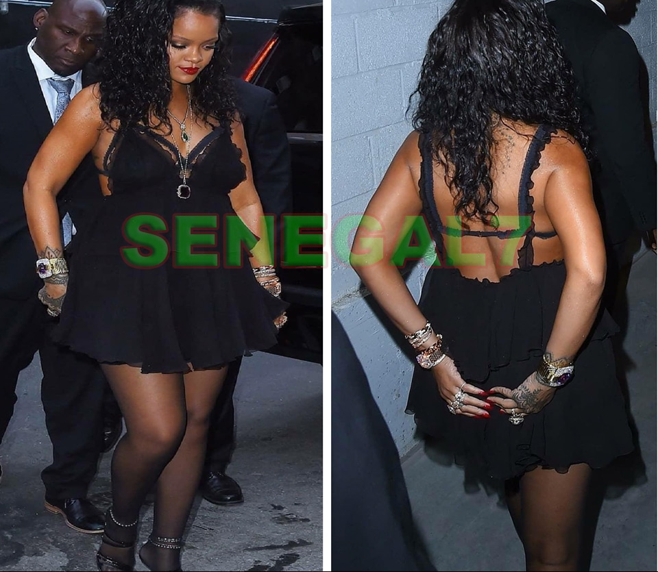 (07 photos) Rihanna opte pour une courte robe très "gênante"